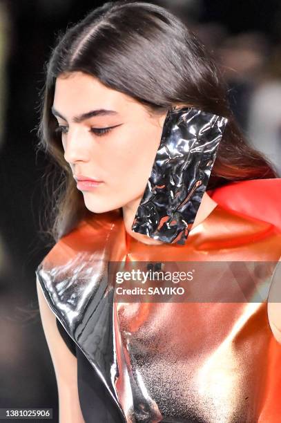 Model walks the runway during the Courreges Ready to Wear Fall/Winter 2022-2023 fashion show as part of the Paris Fashion Week on March 1, 2022 in...