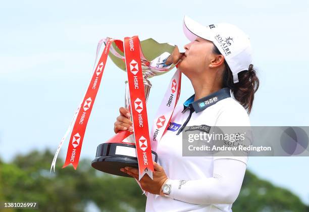 Jin Young Ko of South Korea poses with the HSBC Women's World Championship trophy as she celebrates after winning during the Final Round of the HSBC...