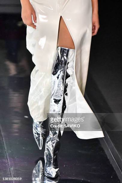Model walks the runway during the Courreges Ready to Wear Fall/Winter 2022-2023 fashion show as part of the Paris Fashion Week on March 1, 2022 in...