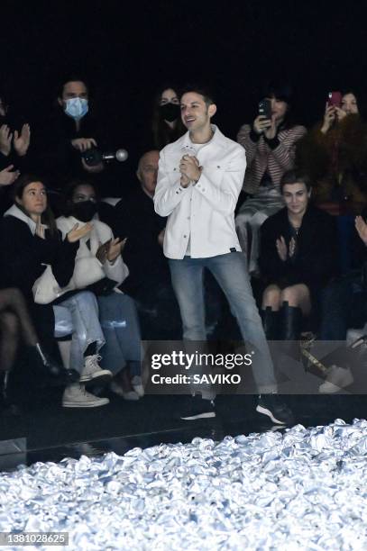 Fashion designer Nicolas Di Felice walks the runway during the Courreges Ready to Wear Fall/Winter 2022-2023 fashion show as part of the Paris...