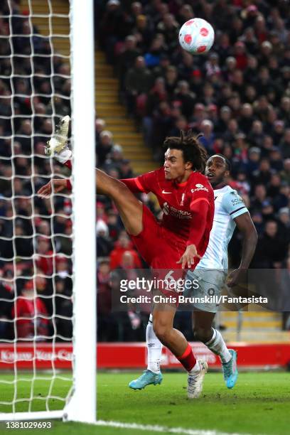Trent Alexander-Arnold of Liverpool clears the ball of the line during the Premier League match between Liverpool and West Ham United at Anfield on...