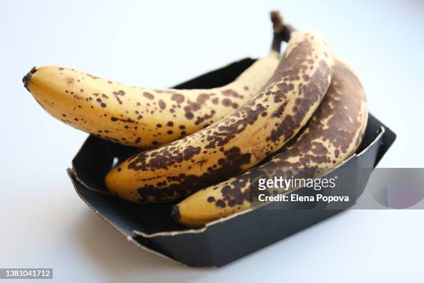 rotting ripe bananas - ripe stock pictures, royalty-free photos & images