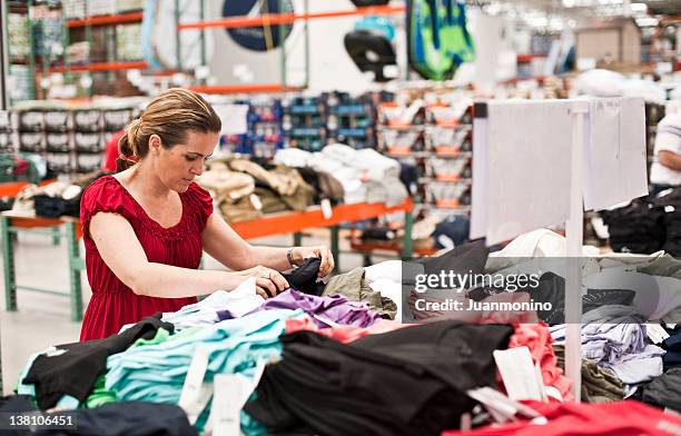 shopping for clothes stock photo - megawinkel stockfoto's en -beelden