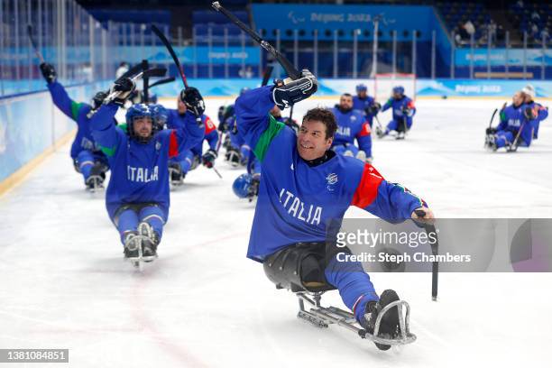 Gian Luca Cavaliere of Team Italy celebrates after beating Slovakia in a shootout during the Group B Preliminary Round Para Ice Hockey game on day...