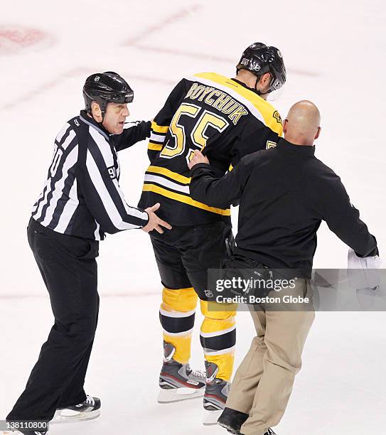 Bruins D Johnny Boychuck is taken off the ice after an injury in the 1st period. The Boston Bruins play the Carolina Hurricanes during a regular...