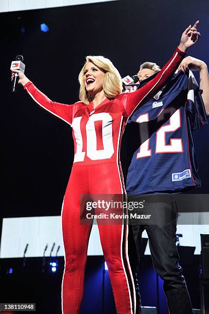 Personality Carrie Keagan and actor Jason Dundas speak onstage during VH1's Super Bowl Fan Jam at Indiana State Fairgrounds, Pepsi Coliseum on...