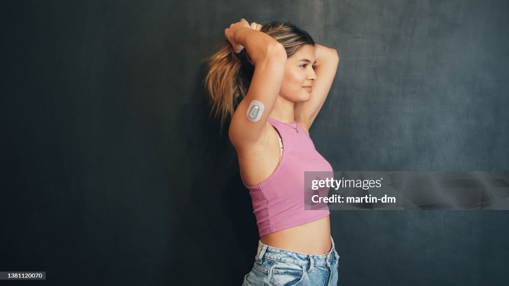 Portrait of young woman with diabetes type1