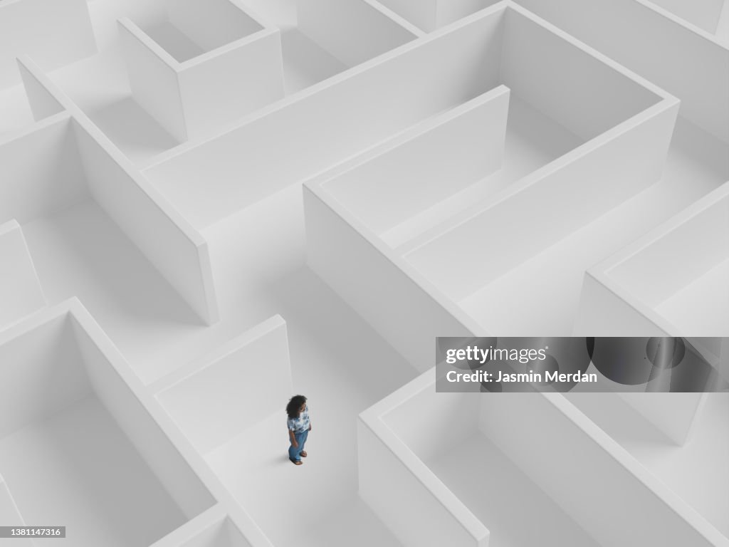 Woman standing inside the maze