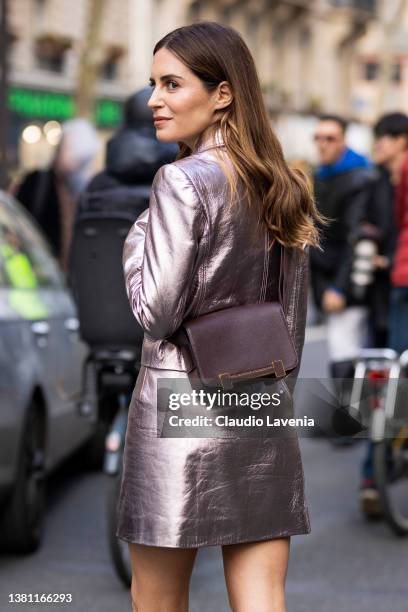 Gala Gonzalez wearing a pink metallic cropped jacket with matching mini skirt and burgundy Hermes bag, is seen outside Hermes, during Paris Fashion...