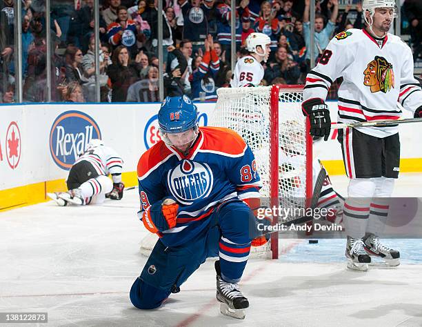 Sam Gagner of the Edmonton Oilers celebrates a third period goal, one of eight points that he scored against the Chicago Blackhawks in a 8-4 win at...