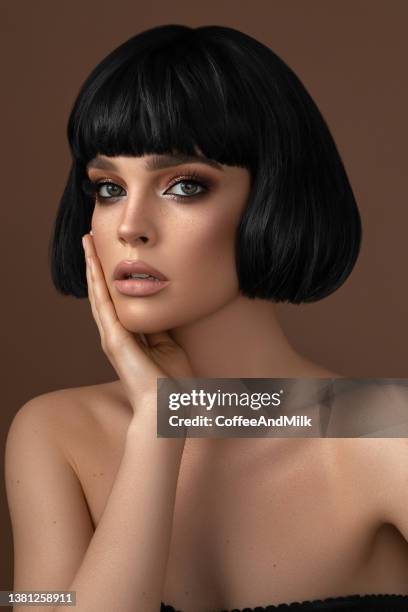 beautiful woman with black short hair - short hair model stock pictures, royalty-free photos & images