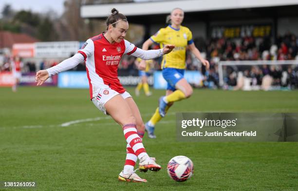 Caitlin Foord of Arsenal Women scores their sides fourth goal during the Barclays FA Women's Super League match between Arsenal Women and Birmingham...