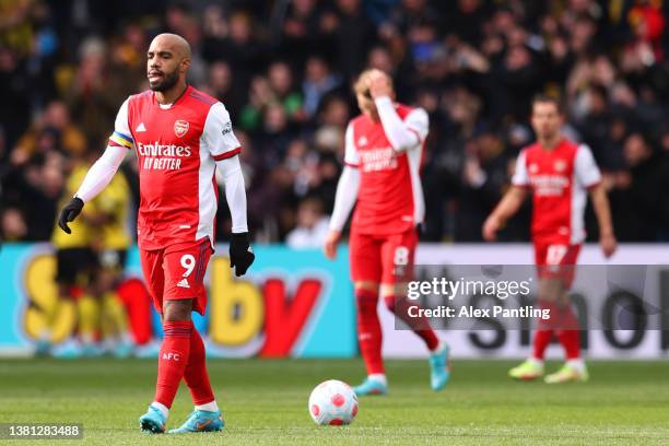 Alexandre Lacazette of Arsenal looks dejected after Cucho Hernandez of Watford FC scores their sides first goal during the Premier League match...