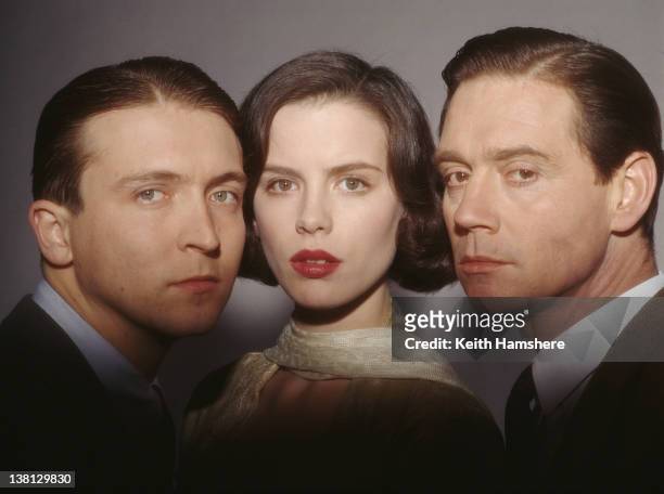 From left to right, actors Alex Lowe, Kate Beckinsale and Anthony Andrews in a publicity still for the film 'Haunted', 1995.