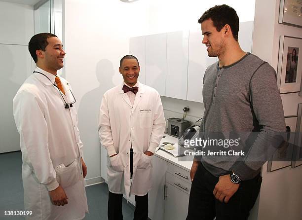 Kris Humphries chats with Alexandre Gause DDS and Lee Gause DDS of Smile Design Manhattan during Celebrities For Smiles hosted by Kris Humphries at...