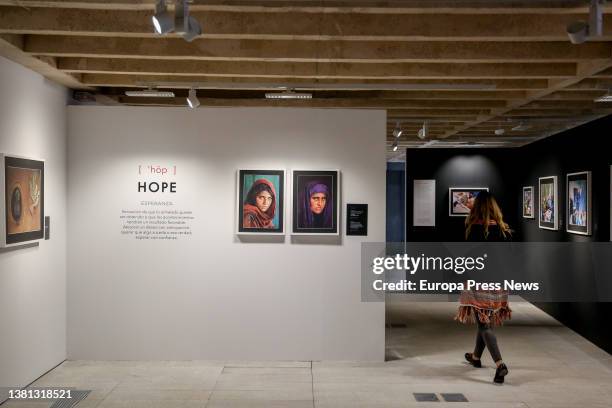 Two portraits of the Afghani woman, Sharbat Gula, taken by Steve McCurry, in the exhibition 'WOMEN, a century of change', at the headquarters of the...