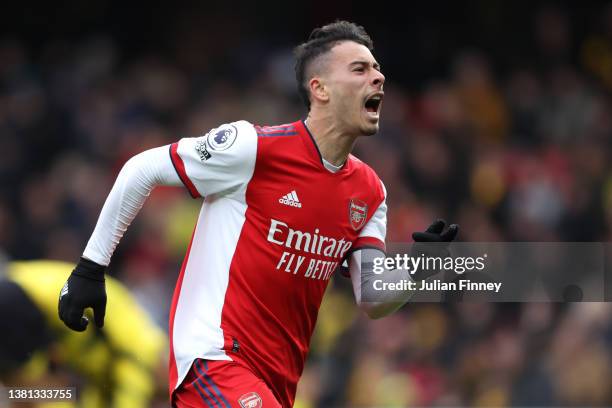 Gabriel Martinelli of Arsenal celebrates after scoring their sides third goal during the Premier League match between Watford and Arsenal at Vicarage...