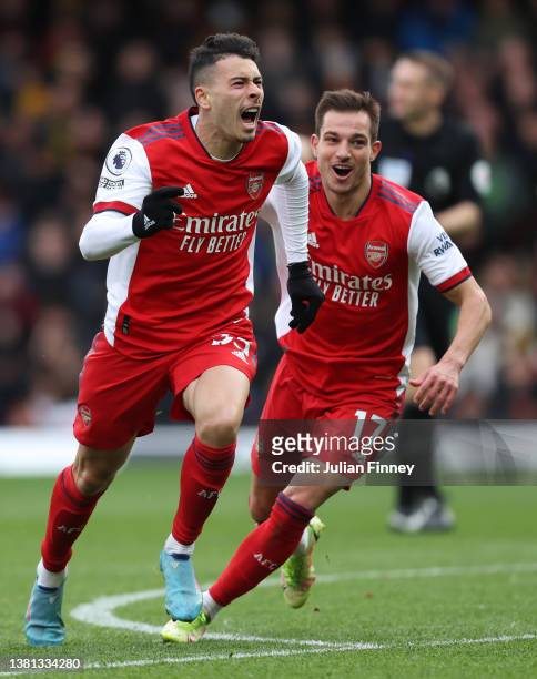 Gabriel Martinelli of Arsenal celebrates after scoring their sides third goal during the Premier League match between Watford and Arsenal at Vicarage...