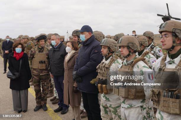 Romanian president Klaus Iohannis , Romanian Defence Minister Nicolae Ciuca and French Defence Minister Florence Parly pose with French troops at...