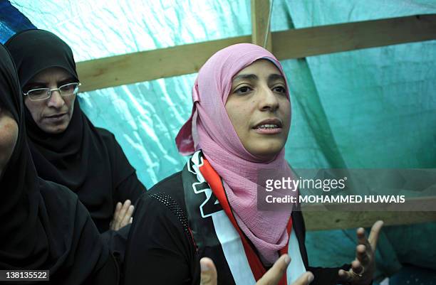 Yemeni journalist and activist Tawakkul Karman, one of three recipients of the 2011 Nobel Peace Prize, is seen inside her protest tent in Change...