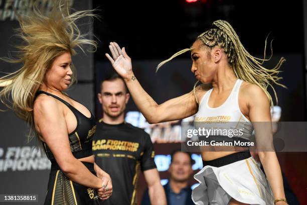 Julia Kruzer slaps Adrianna “Flychanelle” Śledź during the Slap Fighting Championships at the Arnold Sports Festival in the Columbus Convention...