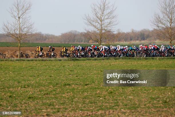 General view of the peloton competing during the 80th Paris - Nice 2022 - Stage 1 a 160km stage from Mantes-la-Ville to Mantes-la-Ville / #ParisNice...