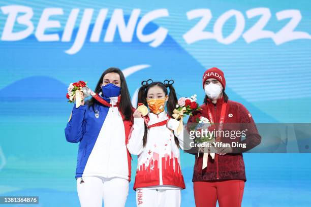 Gold medallist Mengqiu Zhang of Team China , Silver medallist Marie Bochet of Team France and Bronze medallist Alana Ramsay of Team Canada pose...
