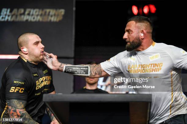 Maksymilian “Mad Max” Leśniak slaps Nikolas “Predator” Toth during the Slap Fighting Championships at the Arnold Sports Festival in Columbus...