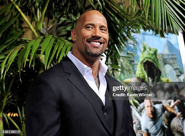 Actor Dwayne Johnson arrives at the premiere of Warner Bros. Pictures' "Journey 2: The Mysterious Island" at the Chinese Theater on February 2, 2012...