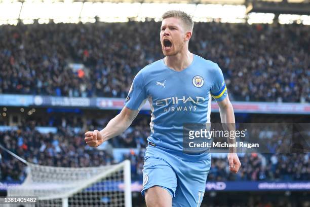 Kevin De Bruyne of Manchester City celebrates after scoring their sides first goal during the Premier League match between Manchester City and...