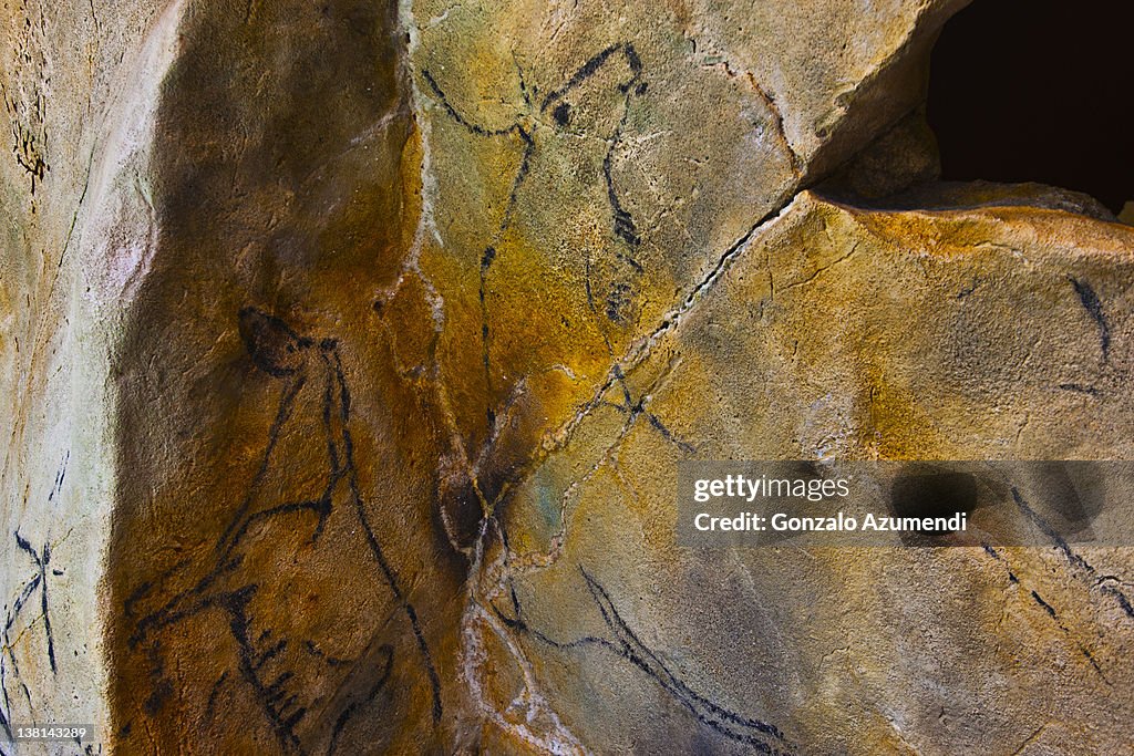 Reproduction of paintings of Las Monedas Cave .