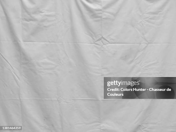 empty and clean white plastic sheet in brussels - tarpaulin stock pictures, royalty-free photos & images