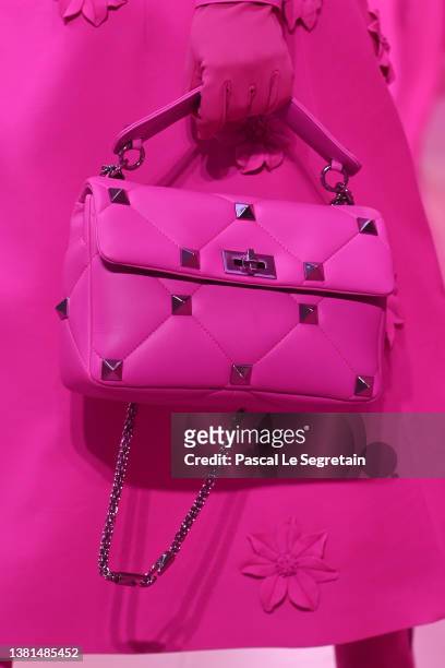 Model, bag detail, walks the runway during the Valentino Womenswear Fall/Winter 2022-2023 show as part of Paris Fashion Week on March 06, 2022 in...