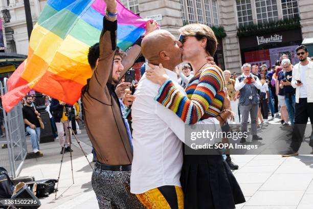 Same-sex couple is seen kissing. Pride Parade, as one of the highlights of Pride Month, takes place in Central London this Weekend, which marked 51...