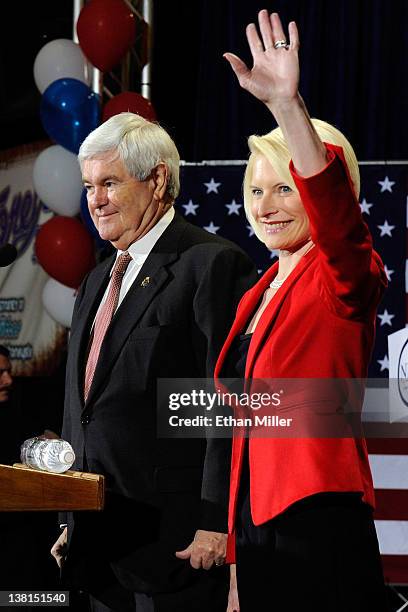 Republican presidential candidate and former Speaker of the House Newt Gingrich and his wife Callista Gingrich arrive at a campaign rally at Stoney's...