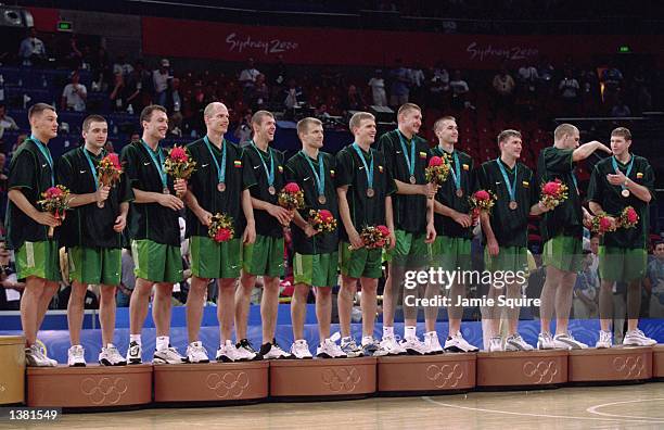 Bronze medalist team Lithuania stands at attention during the medal ceremony following the USA v France men's basketball game at the Sydney SuperDome...