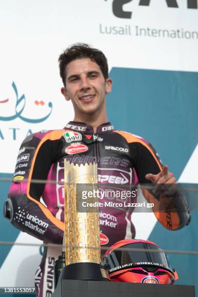 Andrea Migno of Italy and Rivacold Snipers Team celebrates the victory on the podium during the Moto3 race during the MotoGP of Qatar - Race at...