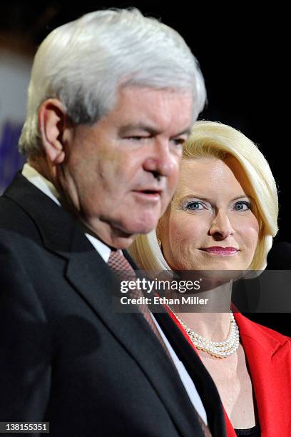 Republican presidential candidate and former Speaker of the House Newt Gingrich is accompanied by his wife Callista Gingrich as he speaks at a...