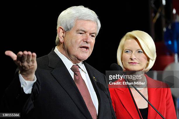 Republican presidential candidate and former Speaker of the House Newt Gingrich is accompanied by his wife Callista Gingrich as he speaks at a...