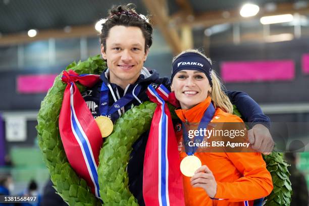 Nils van der Poel of Sweden and Irene Schouten of the Netherlands celebrate winning the ISU World Speed Skating Championships Allround during the ISU...