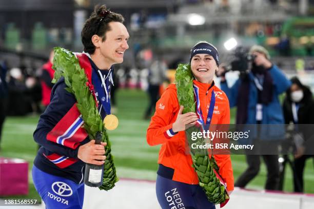 Nils van der Poel of Sweden and Irene Schouten of the Netherlands celebrate winning the ISU World Speed Skating Championships Allround during the ISU...