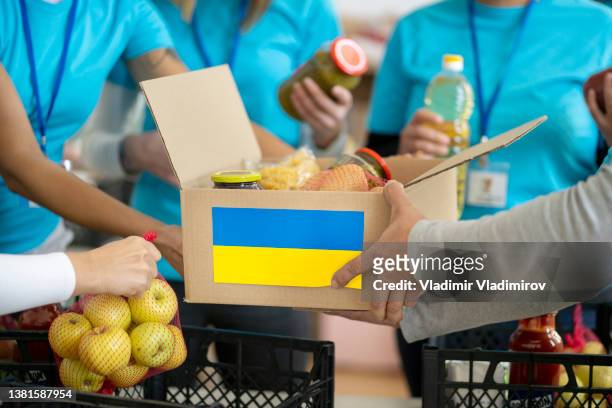 humanitarian aid for people in need in ukraine - refugee camp stock pictures, royalty-free photos & images