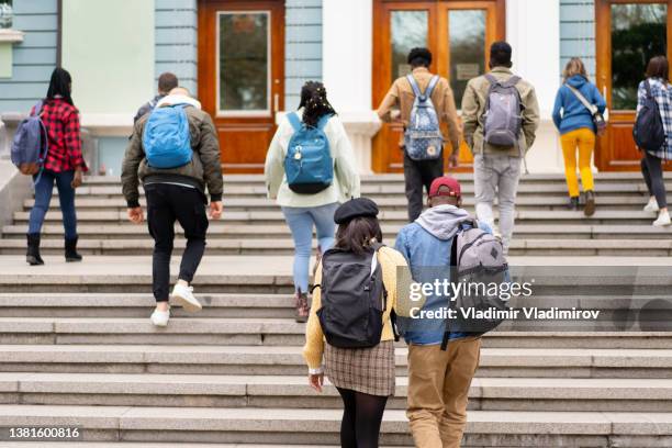 students entering univeresity - high school building entrance stock pictures, royalty-free photos & images