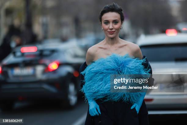 Mary Leest seen wearing blue faux fur off shoulder top, gloves, navy coat, pants, Prada bag outside Elie Saab during Paris Fashion Week - Womenswear...