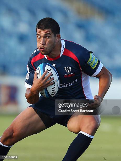 Mark Gerrard of the Rebels runs with the ball during the Super Rugby trial match between the Melbourne Rebels and the Chiefs at Simonds Stadium on...