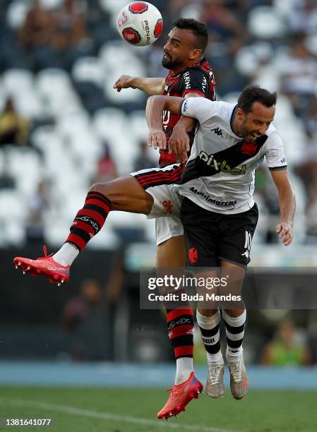 Fabrício Bruno of Flamengo competes for the ball with Nene of Vasco da Gama during a match between Flamengo and Vasco da Gama as part of Campeonato...