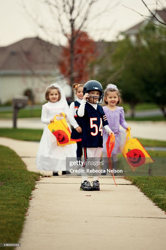 Children walking on sidewalk