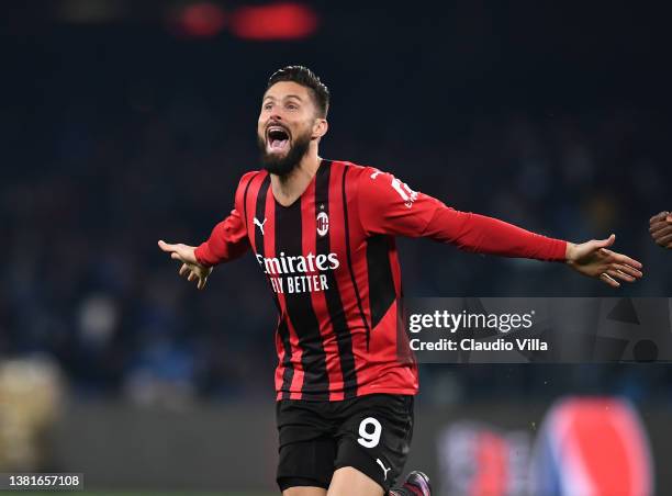 Olivier Giroud of AC Milan celebrates after scoring the opening goal during the Serie A match between SSC Napoli and AC Milan at Stadio Diego Armando...