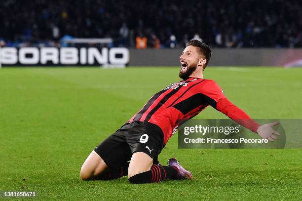 Olivier Giroud of AC Milan celebrates after scoring their sides first goal during the Serie A match between SSC Napoli and AC Milan at Stadio Diego...