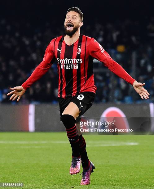 Olivier Giroud of AC Milan celebrates after scoring their sides first goal during the Serie A match between SSC Napoli and AC Milan at Stadio Diego...